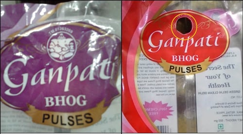 Earlier packet-cover with the picture of Shri Ganesh ; new packet without picture of Shri Ganesh