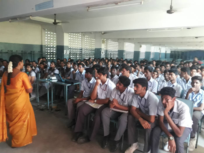 Sou. Suganthi of HJS addressing to the students