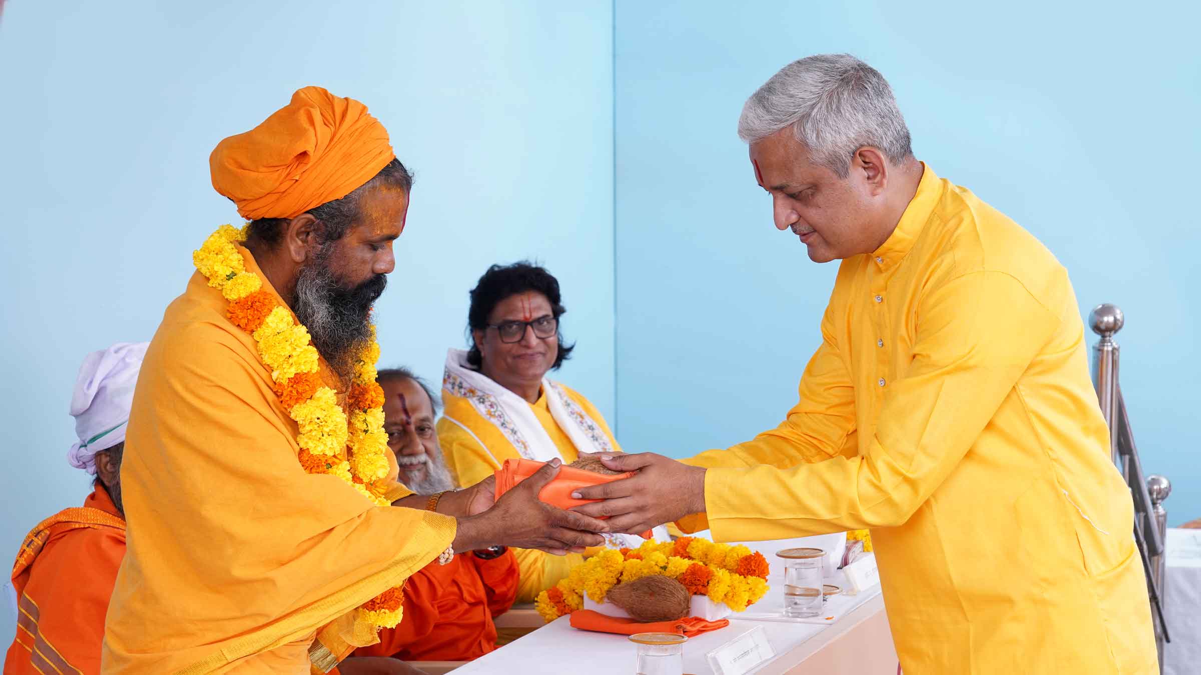 Pujya Bhagirathi Maharaj (Adhyaksha and Sanchalak, Gurukrupa Seva Ashram, Belatrodi, Nagpur, Maharashtra) being felicitated by Mr Abhijeet Polke (Coordinator, Hindu Janajagruti Samiti, Chhattisgarh)