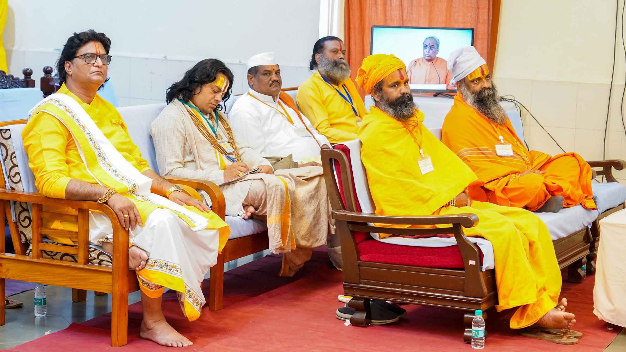 Saints listening intently to the Speakers in the 'Vaishvik Hindu Rashtra Mahotsav'