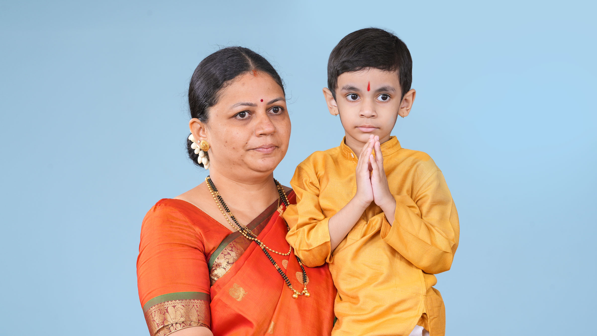 H.H. Vaman Aniruddha Rajandekar (Age 4), the second child-Saint of Sanatan Sanstha who blessed the ‘Vaishvik Hindu Rashtra Mahotsav’ with His auspicious message, in His mother Mrs Manasi Rajandekar’s lap