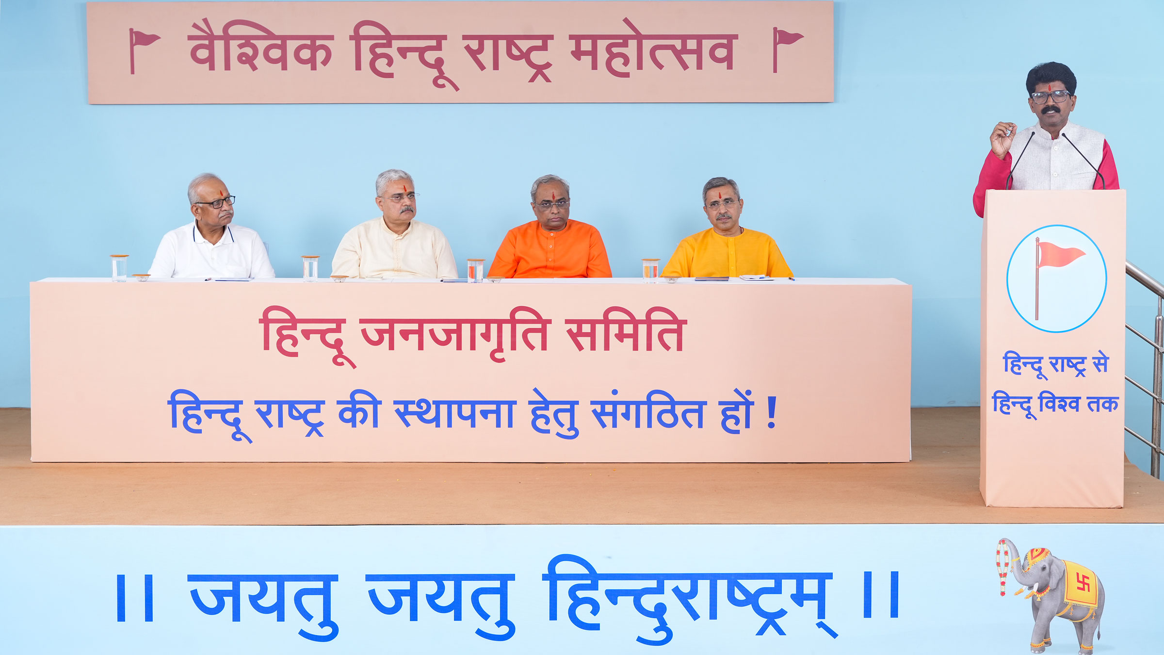 Mr Jayesh Thali (Secretary, Gomantak Mandir Mahasangh, Goa) appealing to the participants to work towards changing the perception of Goa as a morally corrupt destination and promote Hindu culture; (From left) Mr Ravi Shankar Jhunjhunwala, Mr Chandrakant Raipat (Trustee, EKAL Gramotthan Foundation, Seva Bharati and Vice President, VHP, Jharkhand), Sadguru (Dr) Charudatta Pingale and Sadguru Neelesh Singbal