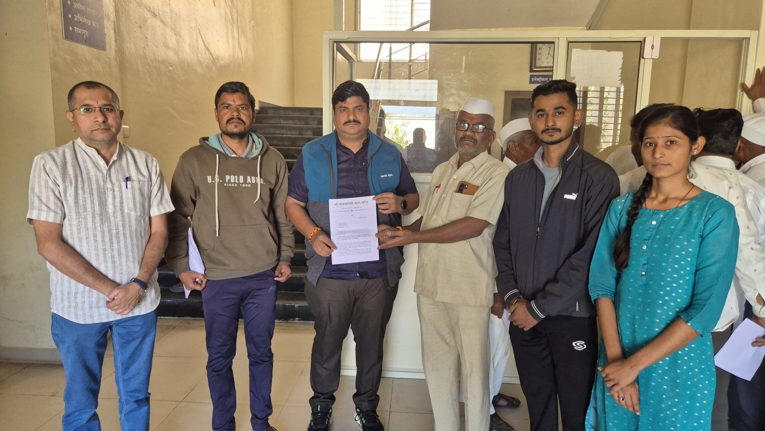 Submitting a memorandum at Manchar (from left): Ganesh Kajale, Eknath Wagh, Assistant Sub-Divisional Officer Sachin Munde, Martand Dere, Akash Wagh, and Kajal Wagh